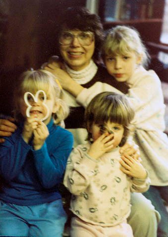 Grandma, my sisters and me (far left): Clearly, I was excited about baking cookies.