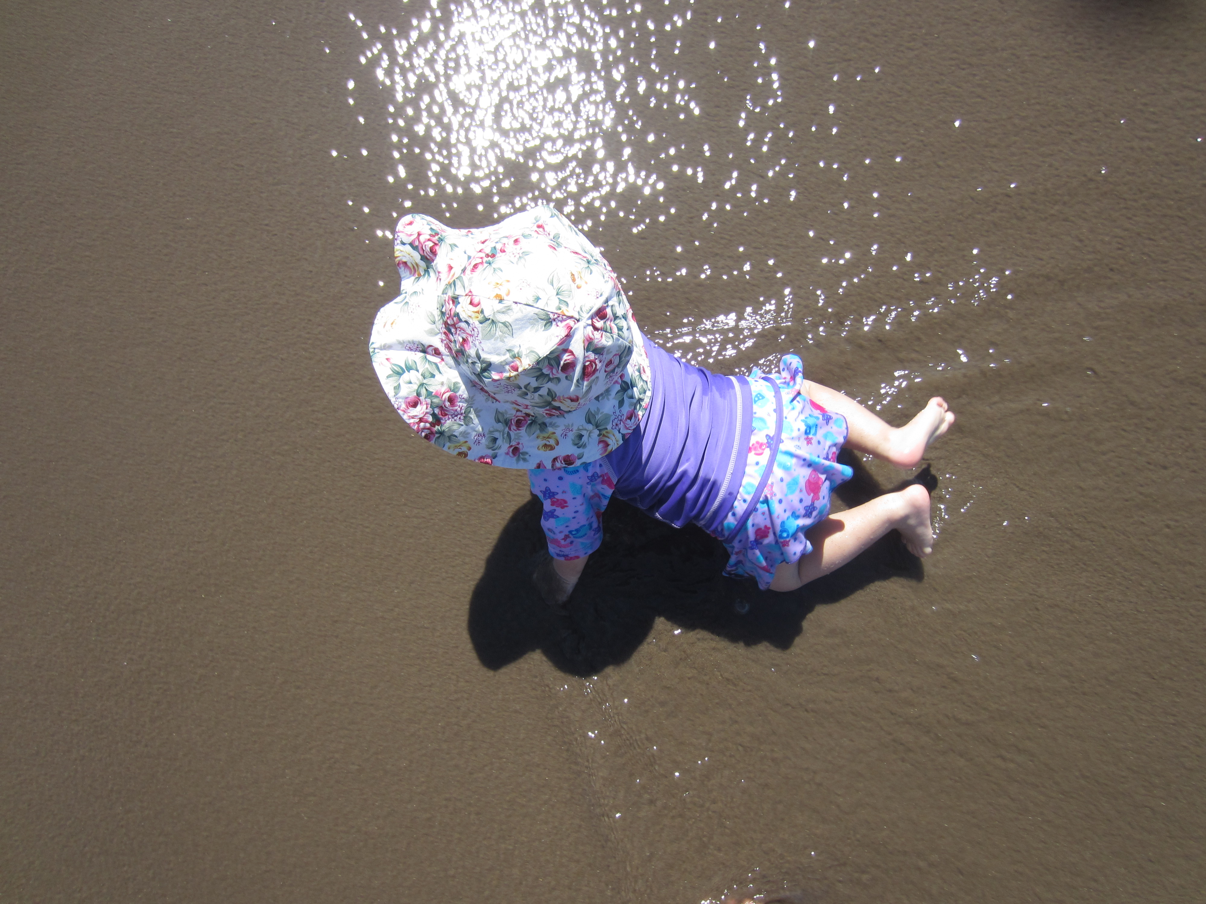Toddler in ocean - Ten Thousand Hour Mama